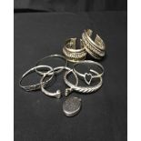 PAIR OF ISLAMIC SILVER BRACELETS ALONG WITH SILVER LOCKET AND OTHER BRACELETS