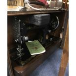 SINGER SEWING MACHINE MODEL 99 encased with booklet