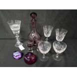 LOT OF CRYSTAL GLASSES also including an amethyst glass liqueur set and two paper weights