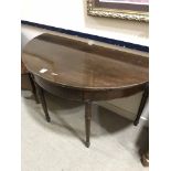 MAHOGANY DEMILUNE TABLE AND AN OCTAGONAL TABLE