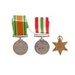 GROUP OF WWII MEDALS to include: The Defence Medal 1939-1945, George V medal, The Italy Star,