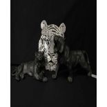 CHINESE PEWTER TIGER with character stamp to base; along with another pewter tiger,
