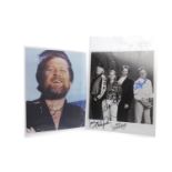 SIGNED PHOTOGRAPH OF 'THE BEACH BOYS' showing four of the members with their four signatures,