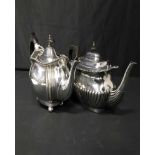 TWO SILVER PLATED THREE PIECE TEA SERVICES