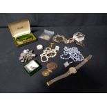 GOOD LOT OF COSTUME JEWELLERY comprising a 9 carat watch, silver charm bracelet, pearls, etc.