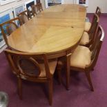 MAHOGANY DINING ROOM SUITE OF GEORGE III DESIGN comprising breakfront sideboard enclosed by frieze