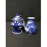 SMALL CHINESE BLUE AND WHITE BALUSTER VASE AND COVER also a pair of miniature blue and white vases