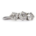 EDWARDIAN DIAMOND THREE STONE RING set with three round brilliant cut diamonds totalling