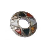 SCOTTISH SILVER HARDSTONE SET BROOCH of circular form, with open centre,