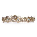 NINE CARAT GOLD OPAL BRACELET pierced and set with round opals, very approximately 17.5cm long, 9.