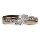 DIAMOND CLUSTER RING the marquise shaped bezel set with round diamonds, on diamond shoulders,