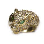 EIGHTEEN CARAT GOLD GEM SET PANTHER HEAD MOTIF RING modelled in the round and with pave set white