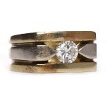 GENTLEMAN'S EIGHTEEN CARAT GOLD BI COLOUR DIAMOND SINGLE STONE RING set with a round brilliant cut