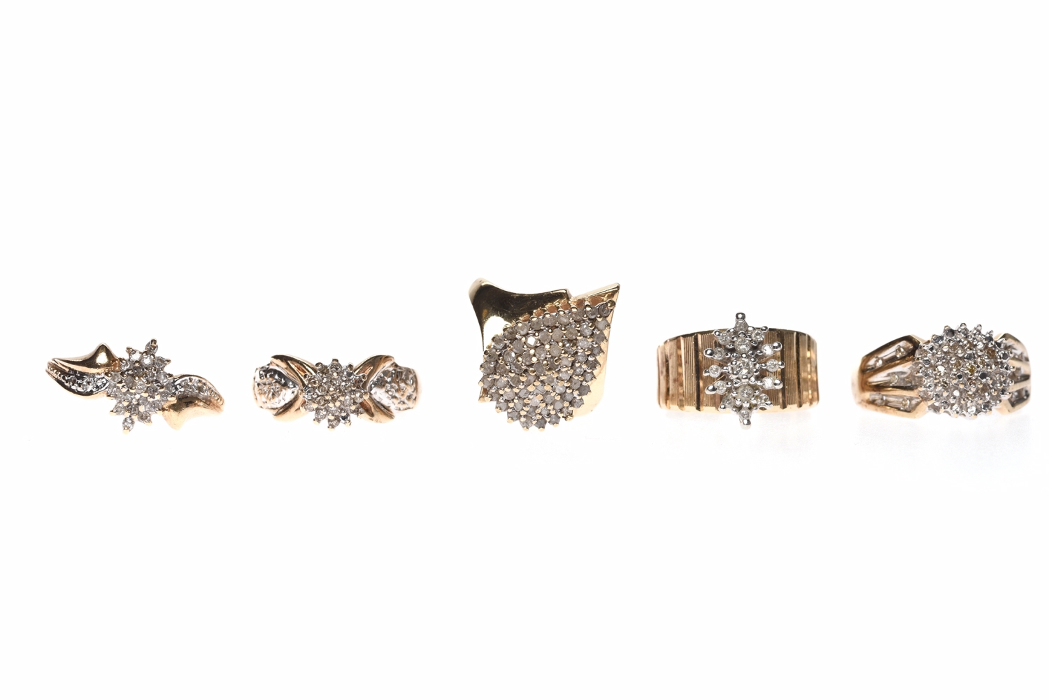 FIVE VARIOUS DIAMOND DRESS RINGS comprising three in ten carat gold, 10.