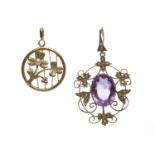EDWARDIAN AMETHYST AND SEED PEARL PENDANT of openwork form,