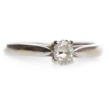 EIGHTEEN CARAT WHITE GOLD DIAMOND SOLITAIRE RING with a four claw set oval diamond of approximately