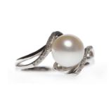 NINE CARAT PEARL AND DIAMOND RING set with a single white spherical white pearl 8mm diameter on