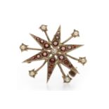 LATE VICTORIAN GARNET AND SPLIT PEARL STAR MOTIF BROOCH set with a central white split pearl,