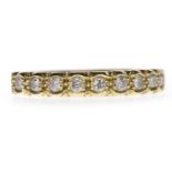 EIGHTEEN CARAT GOLD DIAMOND HALF ETERNITY BAND set with round brilliant cut diamonds totalling