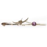 THREE EARLY TWENTIETH CENTURY BROOCHES comprising a seed pearl set crescent motif brooch with a