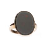 GENTLEMAN'S EARLY TWENTIETH CENTURY BLOODSTONE SIGNET RING the oval stone measuring approximately