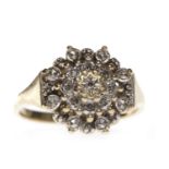 NINE CARAT GOLD CLUSTER RING the round brilliant cut diamonds totalling approximately 0.