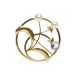 LATE TWENTIETH CENTURY NINE CARAT GOLD AMETHYST AND PEARL BROOCH of circular open form and with a