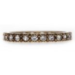 NINE CARAT GOLD FULL ETERNITY RING the round brilliant cut diamonds totalling approximately 0.