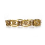 EARLY TO MID TWENTIETH CENTURY FIFTEEN CARAT GOLD BRACELET formed by open oval floral motif links