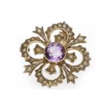 EDWARDIAN AMETHYST AND SEED PEARL BROOCH of quatrefoil form,