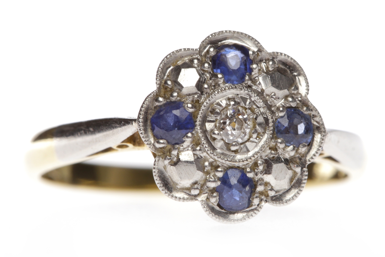 SAPPHIRE AND DIAMOND FLOWER CLUSTER RING set with a round brilliant cut diamond totalling