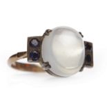 ART DECO MOONSTONE AND SAPPHIRE DRESS RING set with a central large cabochon cut moonstone 13x11mm,