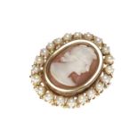 LATE TWENTIETH CENTURY CAMEO BROOCH set with an oval cameo carved to depict a female in profile