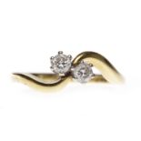 EIGHTEEN CARAT GOLD DIAMOND TWO STONE RING with two round brilliant cut diamonds totalling