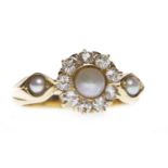 LATE VICTORIAN EIGHTEEN CARAT GOLD PEARL AND DIAMOND DRESS RING set with a central split pearl 4mm