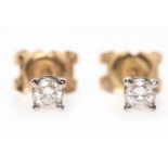 PAIR OF DIAMOND STUD EARRINGS each set with a single round brilliant cut diamond of approximately 0.