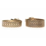 TWO GOLD PLATED BRACELETS both with herringbone pattern links and with a central row of rectangular