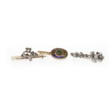 TWO NINETEENTH CENTURY DIAMOND BROOCHES one in the form of a floral spray to a bar, unmarked,