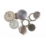 GROUP OF MILITARY ISSUE CASE BACKS AND DIALS including a case back with A.