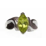 EIGHTEEN CARAT GOLD GEM SET RING the marquise shaped green gem of approximately 10.
