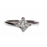 EIGHTEEN CARAT WHITE GOLD DIAMOND SOLITAIRE RING with a four claw set princess cut diamond of