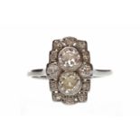 ART DECO DIAMOND DRESS RING the pierced plaque bezel 14mm long and with two collet set principal