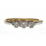 EIGHTEEN CARAT GOLD DIAMOND THREE STONE RING set with three round brilliant cut diamonds totalling