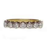 EIGHTEEN CARAT GOLD DIAMOND HALF ETERNITY RING set with round brilliant cut diamonds totalling