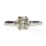 EIGHTEEN CARAT GOLD DIAMOND SOLITAIRE RING with a six claw set round brilliant cut diamond of