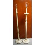 TWO SIMILAR CREAM PAINTED WOODEN STANDARD LAMPS. (2)