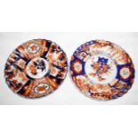 TWO SIMILAR JAPANESE IMARI DISHES, each decorated in typical palette with lobed sides, 12'' (