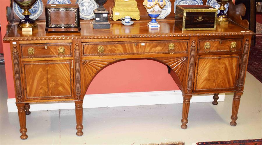 A WILLIAM IV PERIOD MAHOGANY SIDEBOARD, probably Irish, with three quarter back and plate rack above - Image 3 of 3