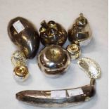 A COLLECTION OF FILLED SILVER FRUIT AND NUT ORNAMENTS, comprising banana, three apples, pear and two