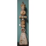 A STONEWARE CELTIC STYLE TABLE LAMP, with cruciform centre on a square flared base, 41'' (104cm);